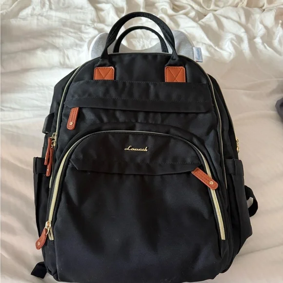 Black and Brown Backpack with Padded Straps and Durable Fabric - Picture 8 of 11